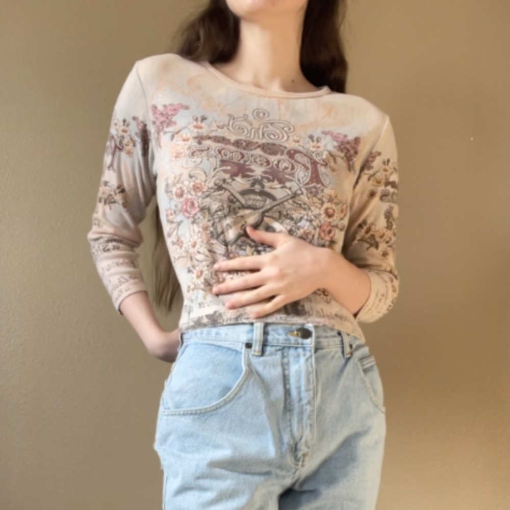 Beige or light peach Biker/Tattoo style long sleeved shirt. Slightly cropped fit